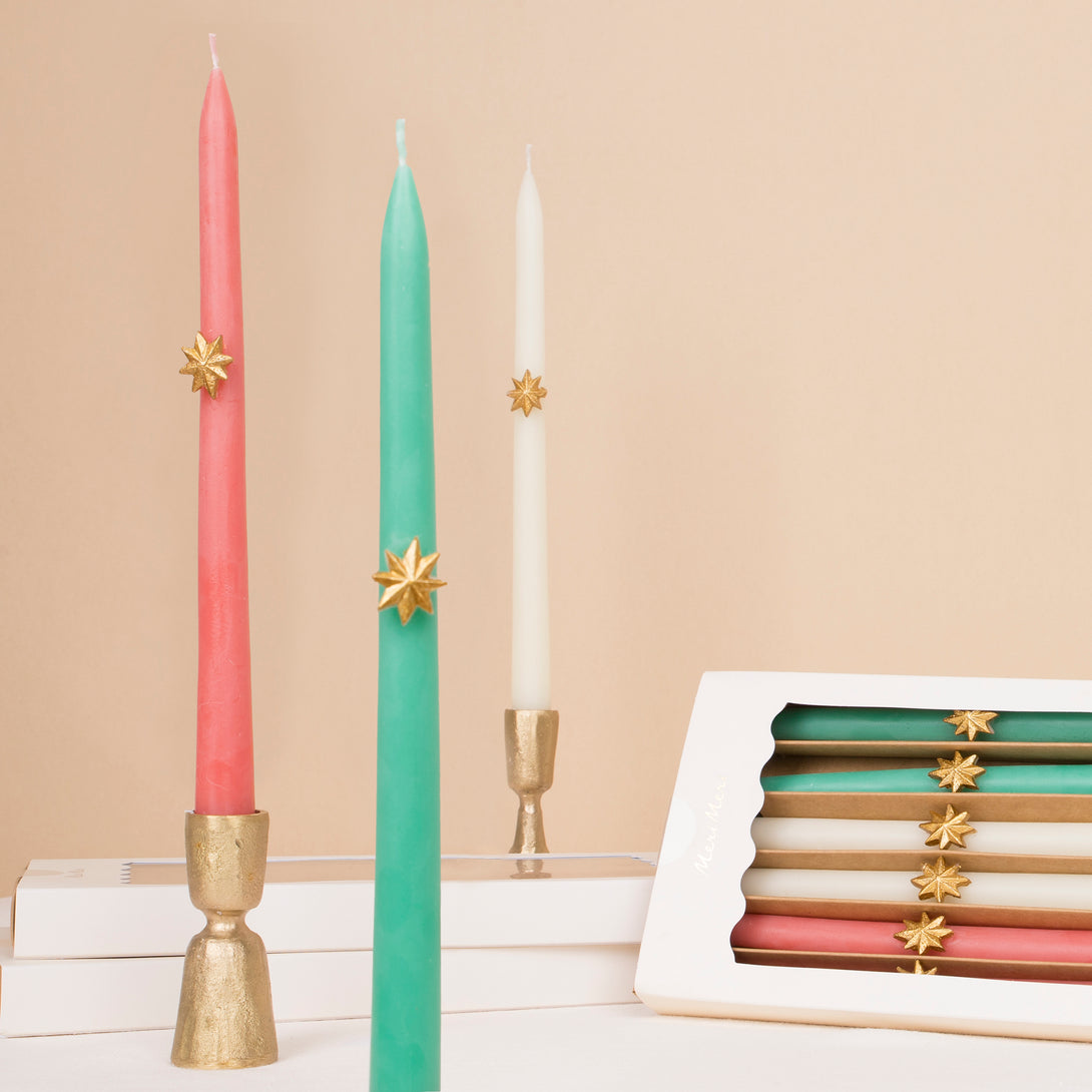 Our Christmas tall candles features gold wax stars and coloured wicks for a sensational effect, a great host gift.