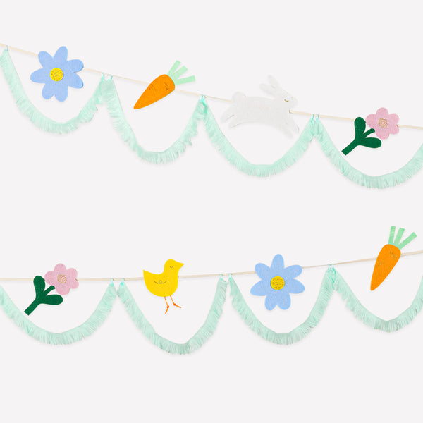 Our fabric garland is perfect to add to your Easter decorations, featuring felt Easter icons and playful tasselled fringe details for fun and style. Image1