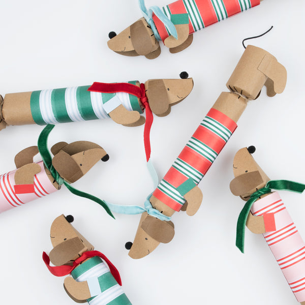 Our sausage dog Christmas crackers are utterly charming, and each contain a paper hat, joke and a sausage dog pin badget. Image5