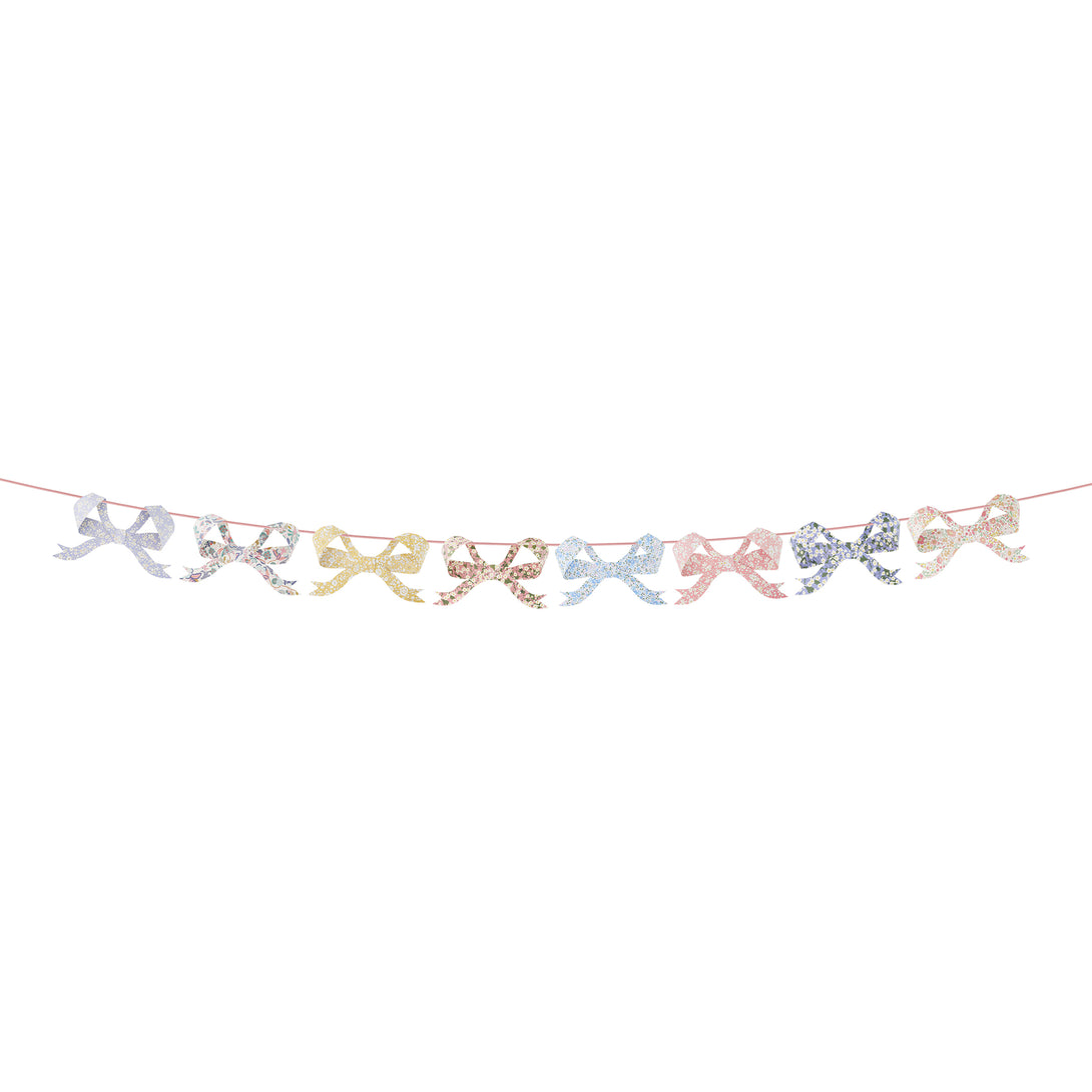 Our paper garland has pretty Liberty bow pennants and a pink velvet ribbon, a versatile garland