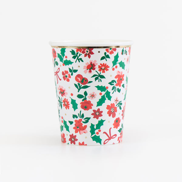 Our Christmas cups, made from paper, feature a beautiful floral ditsy design in striking red and green. They're perfect for hot and cold drinks. Image1