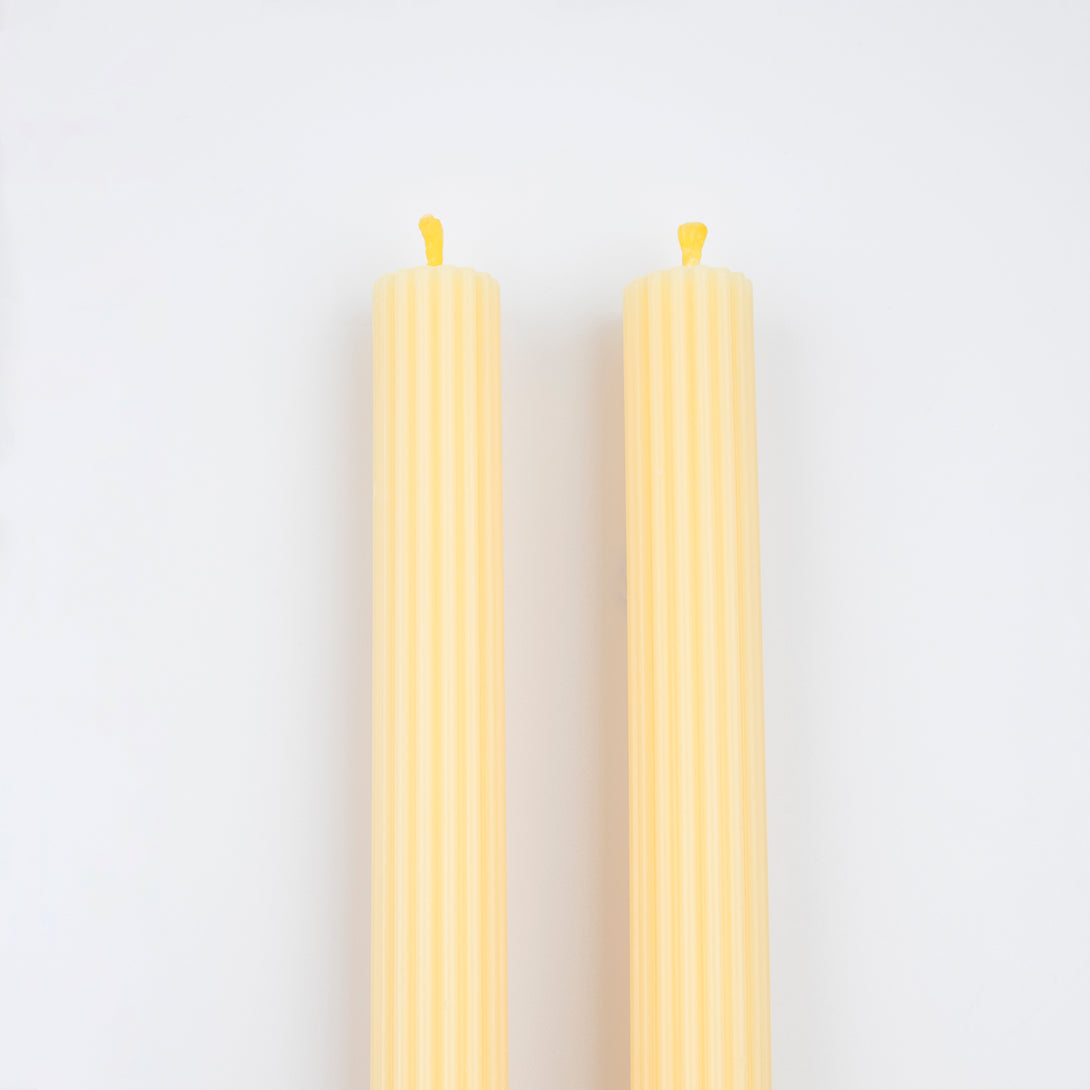 Our long candles, in a cheery yellow, look amazing on the mantel or table. Image3