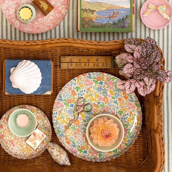 Our small round accessory tray, with a stylish scalloped edge, is made from enamelled metal with a Liberty floral design, a great hostess gift. Image2