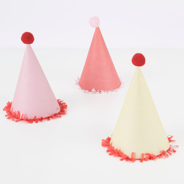 Our paper hats feature fringing, pompoms and bright colours. Image4