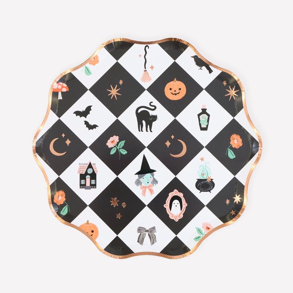 Our Halloween party plates, made from paper in a side plate size, feature a vibrant patchwork design with happy Halloween characters and icons. Image1