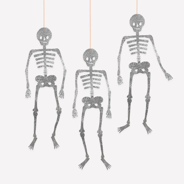 Our giant skeleton decorations are perfect for adding  fun statement to your Halloween celebration, with moveable joints and lots of silver glitter. Image1