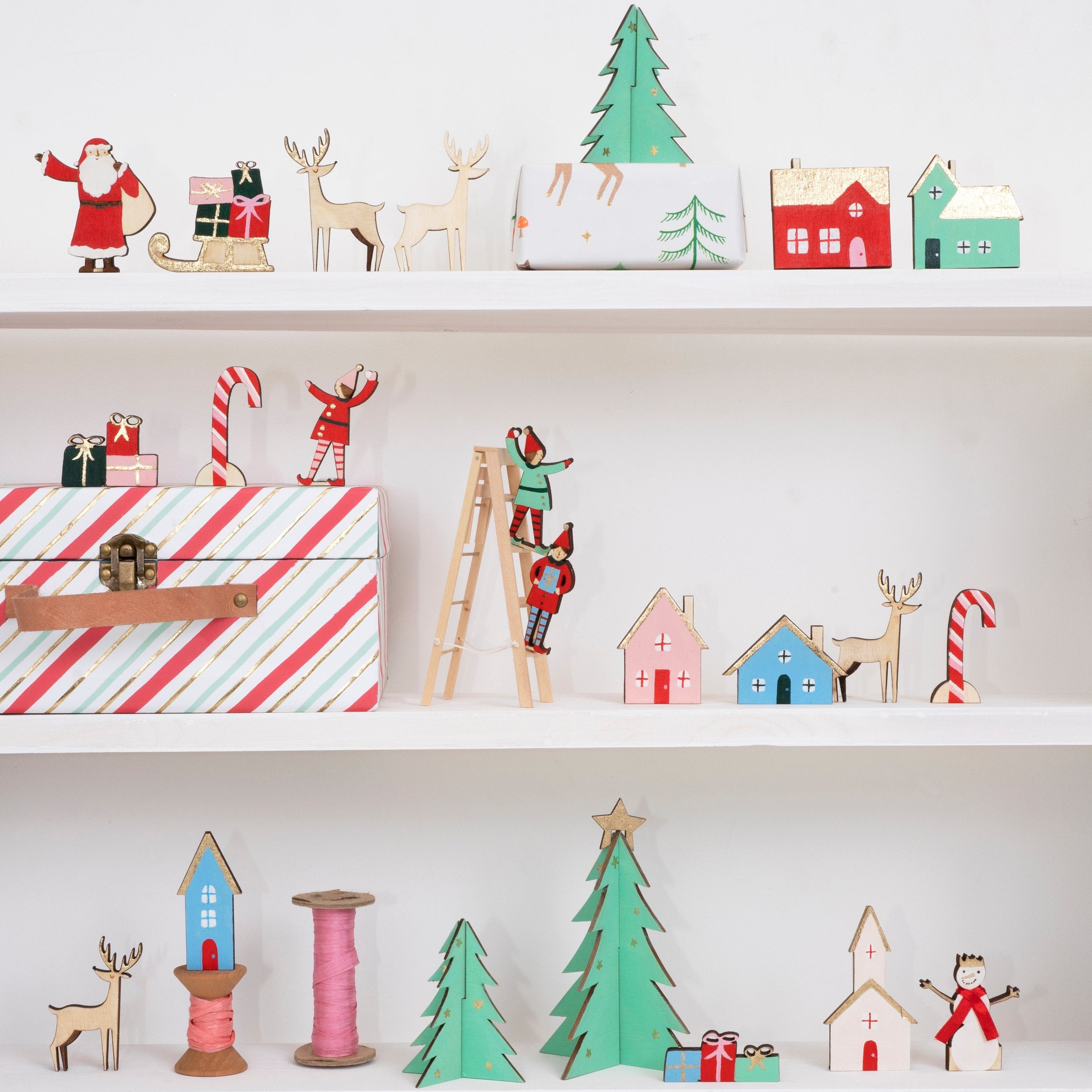 Build a Christmas village scene with our wooden advent calendar, to create a beautiful wooden Christmas decoration.