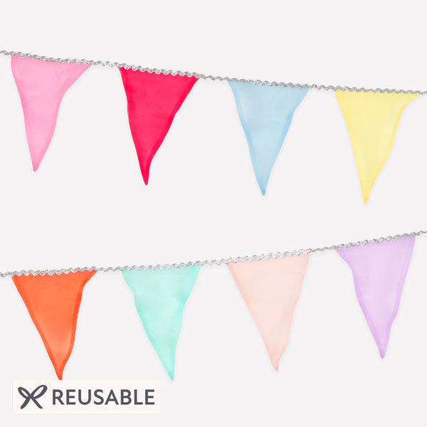 Our rainbow garland is ideal to add charm and colour to any celebration, made with organza flags in 8 colours it's reusable and decorative. Image1
