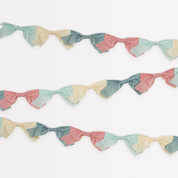 Our velvet bow fabric garland makes a special hanging decoration for a baby shower or bridal shower. Image2