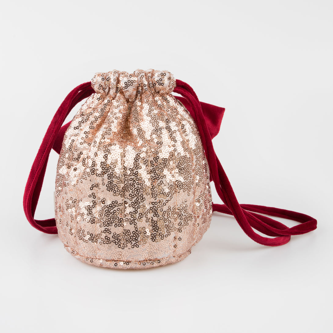 Our Christmas bag is the perfect accessory for Christmas dress up, with pink sequinned tulled and a big red velvet bow.