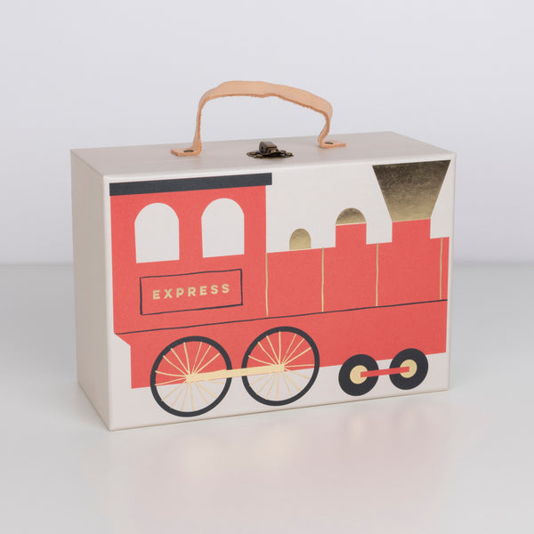 This kids advent calendar is presented in a mini suitcase which contains wooden trains. Image5