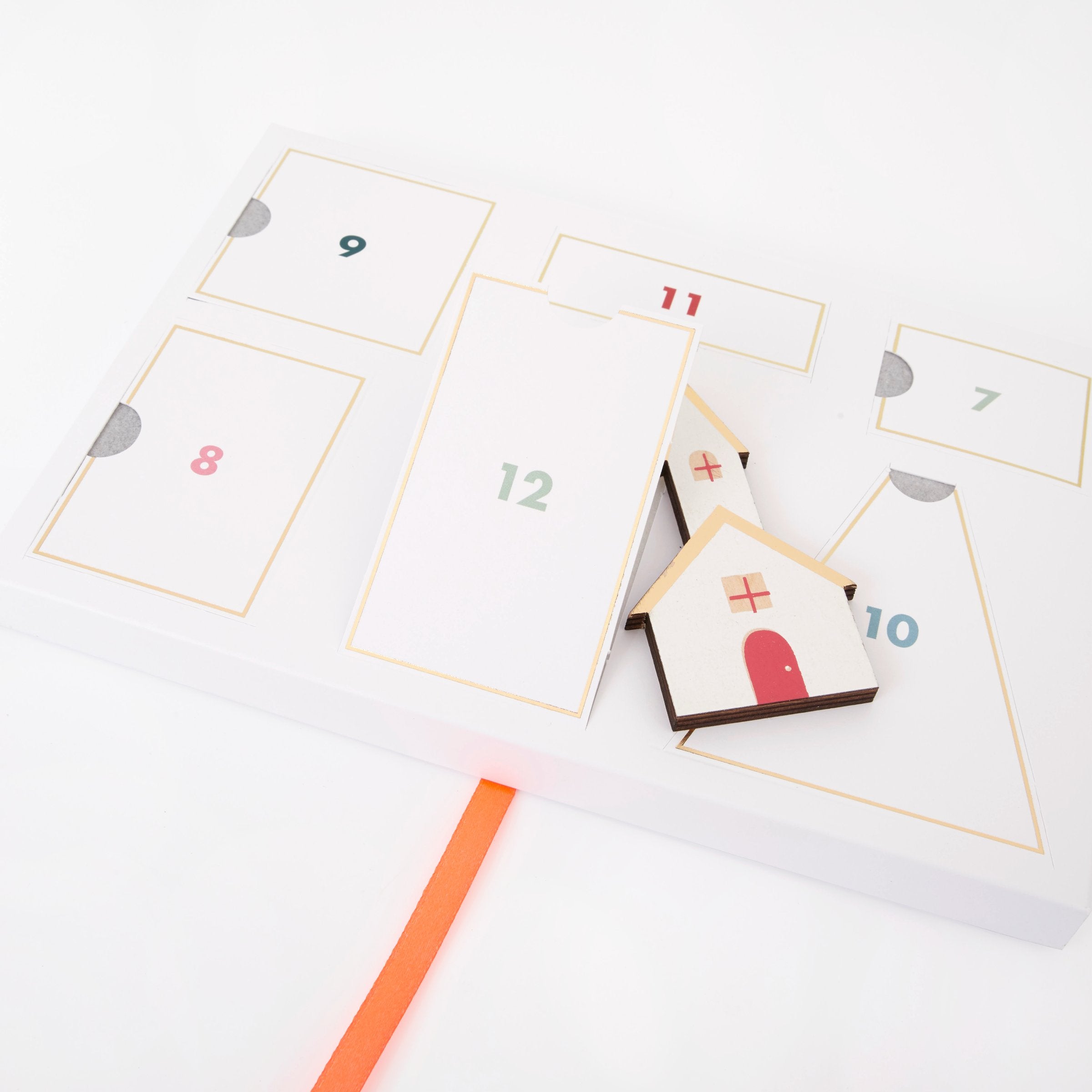 Build a Christmas village scene with our wooden advent calendar, to create a beautiful wooden Christmas decoration.