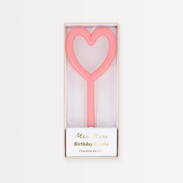 Add a loving touch to a special cake with our pink candle in the shape of a heart.