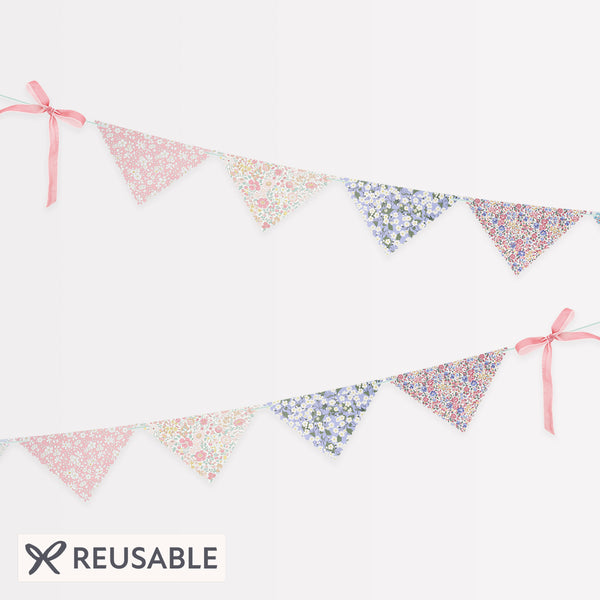 Use our party garland, with floral Liberty print designs and velvet embellishments, as part of your baby shower decorations. Image1