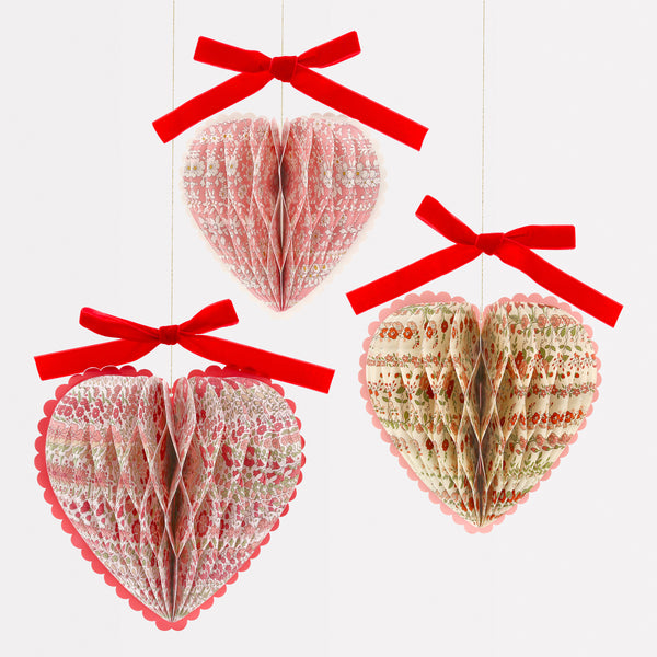 Our honeycomb hearts make wonderful Valentine's decorations. They're made with Liberty floral print designs and elegant velvet bows. Image1