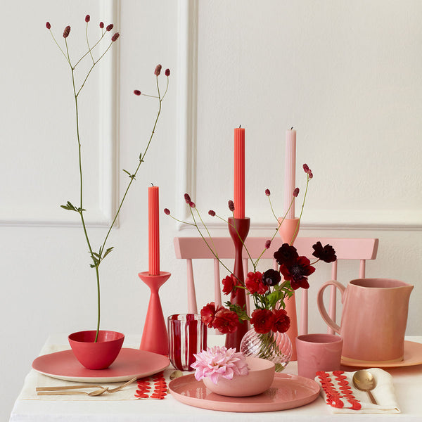 Our tall candles, in a pink colour with ridged details, add a stunning look to any party. Image2