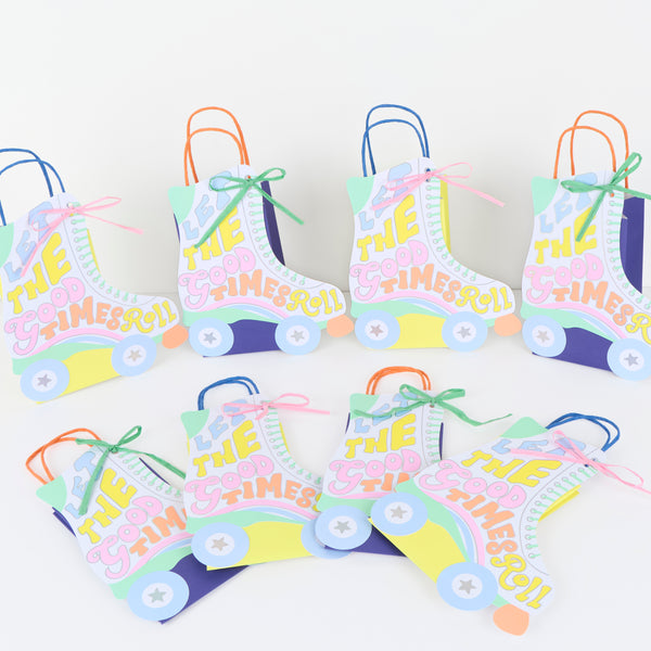 Our party bags, in a fun roller skate shaped design, feature paper based raffia bows, twisted paper handles, and lots of groovy colours. Image1