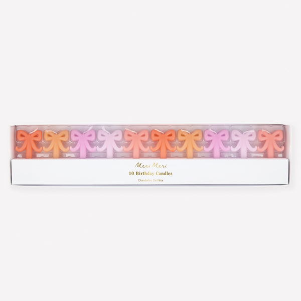 Our mini birthday candles, in a stylish bow shape in five shades of pink and peach, are ideal to add decoration to birthday or bridal shower. Image1