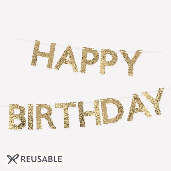 Our gold birthday garland, made from glitter fabric, is perfect to add to your birthday decorations, to reuse year after year. Image1