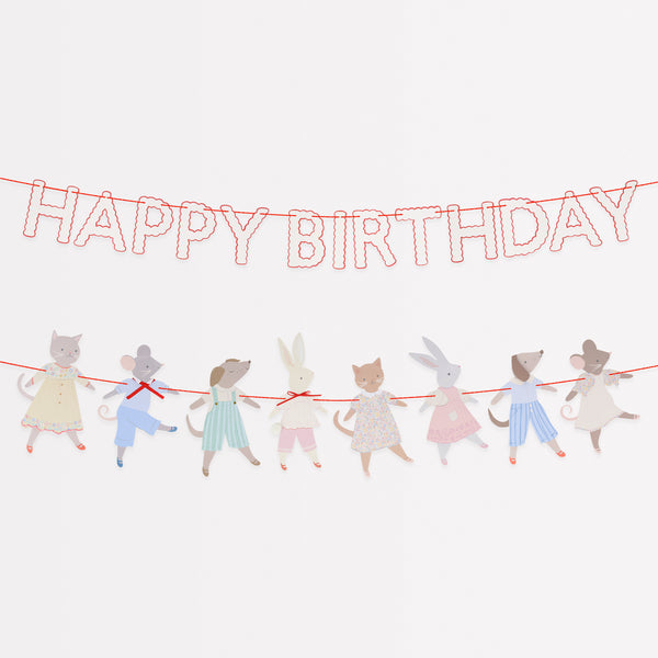 Our Animal Friends party set is ideal for first birthdays, featuring adorable tableware, party bags, party hats and a large paper garland. 