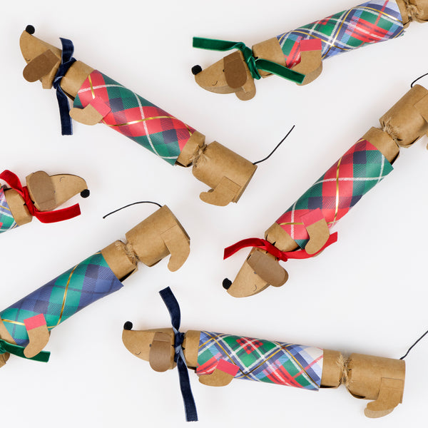 Our sausage dog Christmas crackers have adorable tartan coats and velvet scarves, and contain a paper hat, joke and sausage dog pin. Image4
