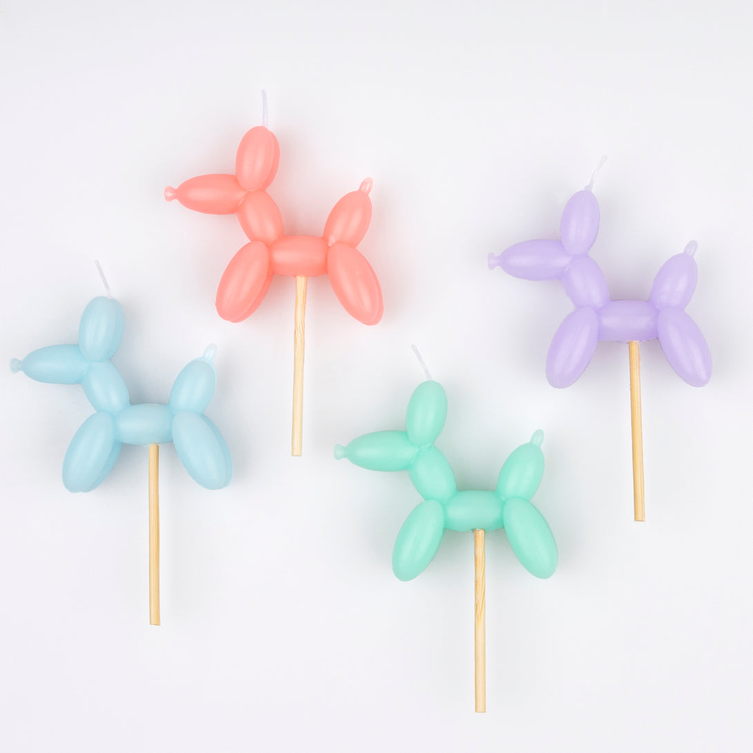 Make your birthday cake decorations look amazing with our fun candles crafted in the shapes of colourful balloon dogs.