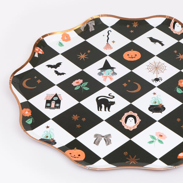 Our Halloween plates, made from paper in a dinner plate size, feature a patchwork pattern, happy characters and shiny pops of copper foil. Image2