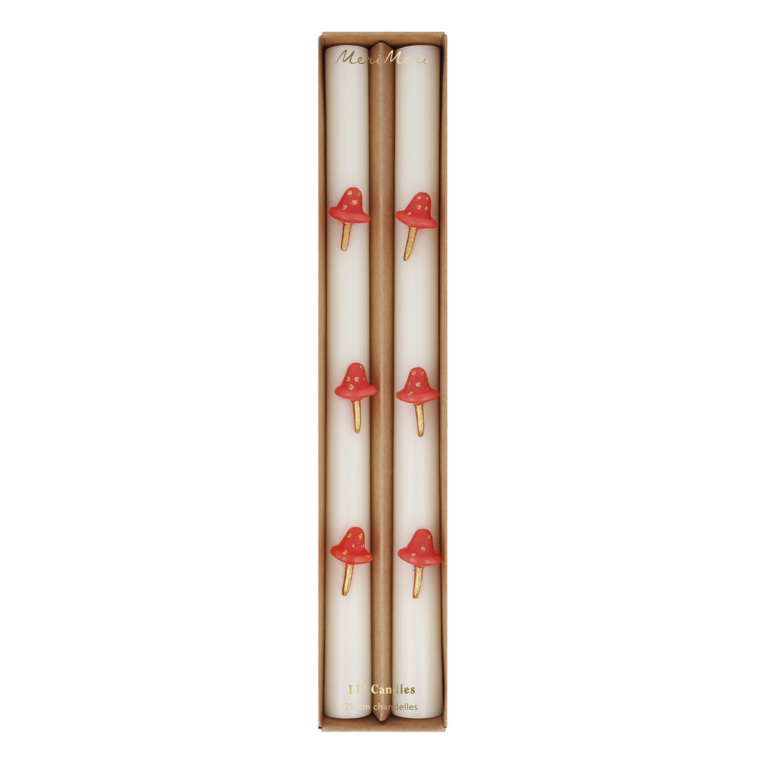 Our Christmas candles, with red and gold mushroom details, have fun red wicks and are perfect as Christmas table decorations.