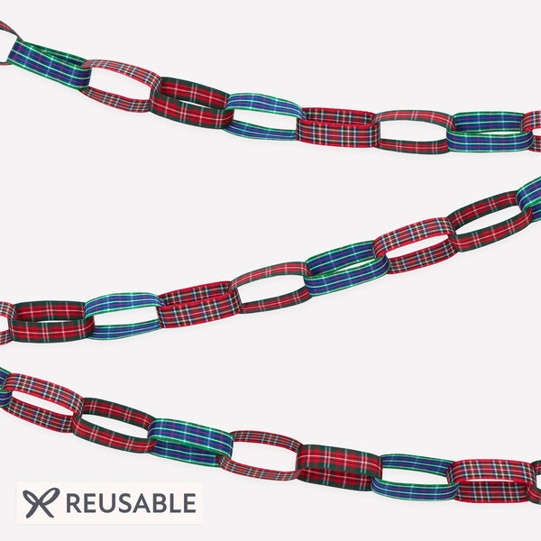 Our Christmas garland features tartan ribbon links, in classic festive colours, for a sophisticated decoration with a nod to nostalgia. Image1