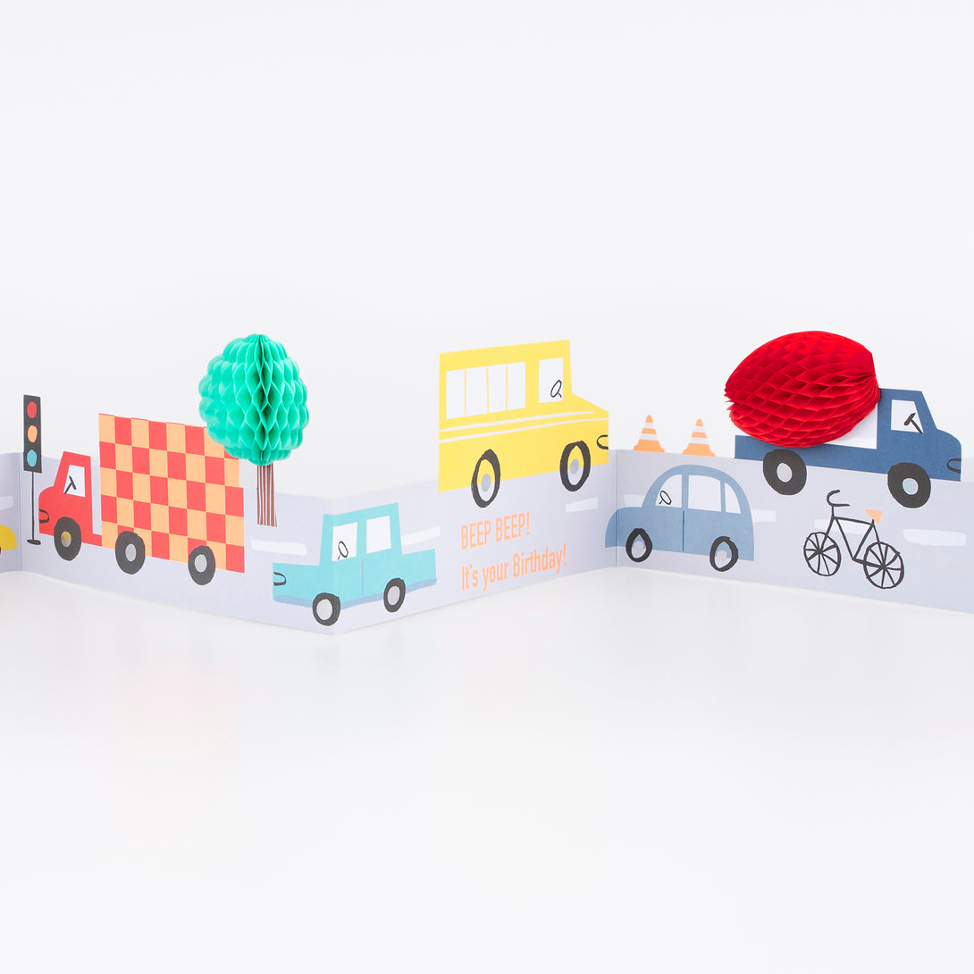 Our concertina card, with lots of colourful vehicles, is the perfect birthday card for a transport-themed party.