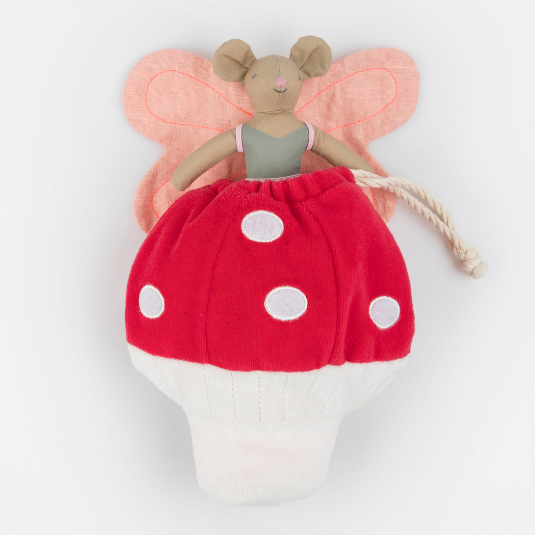 Our special play set includes a mini fabric mouse doll, with fairy wings, and a velvet mushroom drawstring pouch.