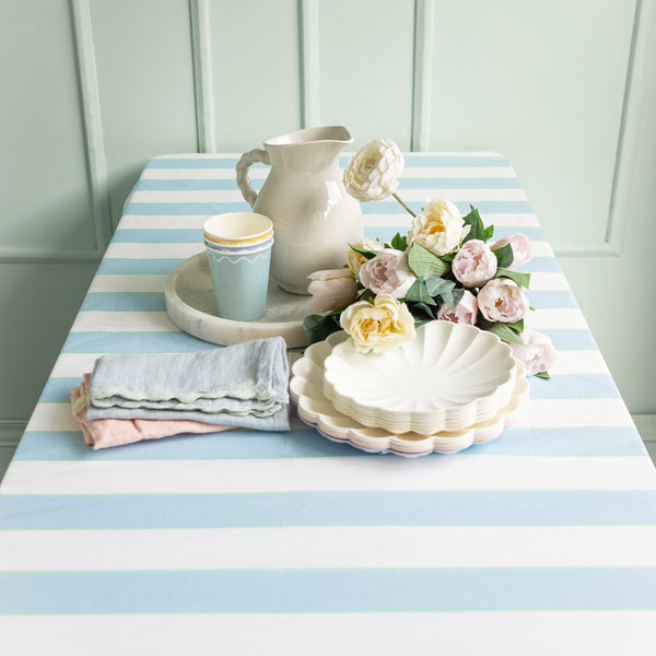 Our paper tablecloth, with a blue stripe, will make any party look stylish. Image2