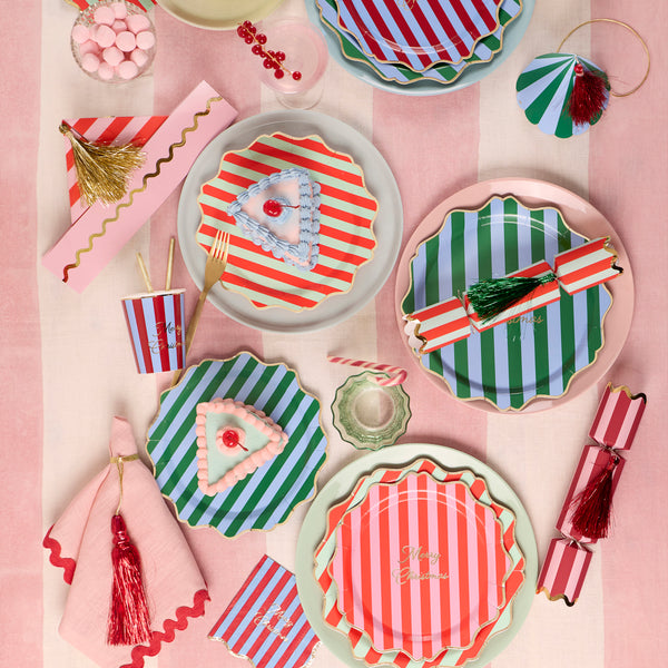 Our paper Christmas side plates feature bold stripes, a Merry Christmas message in shiny gold fold and wavy borders, striking and special. Image2