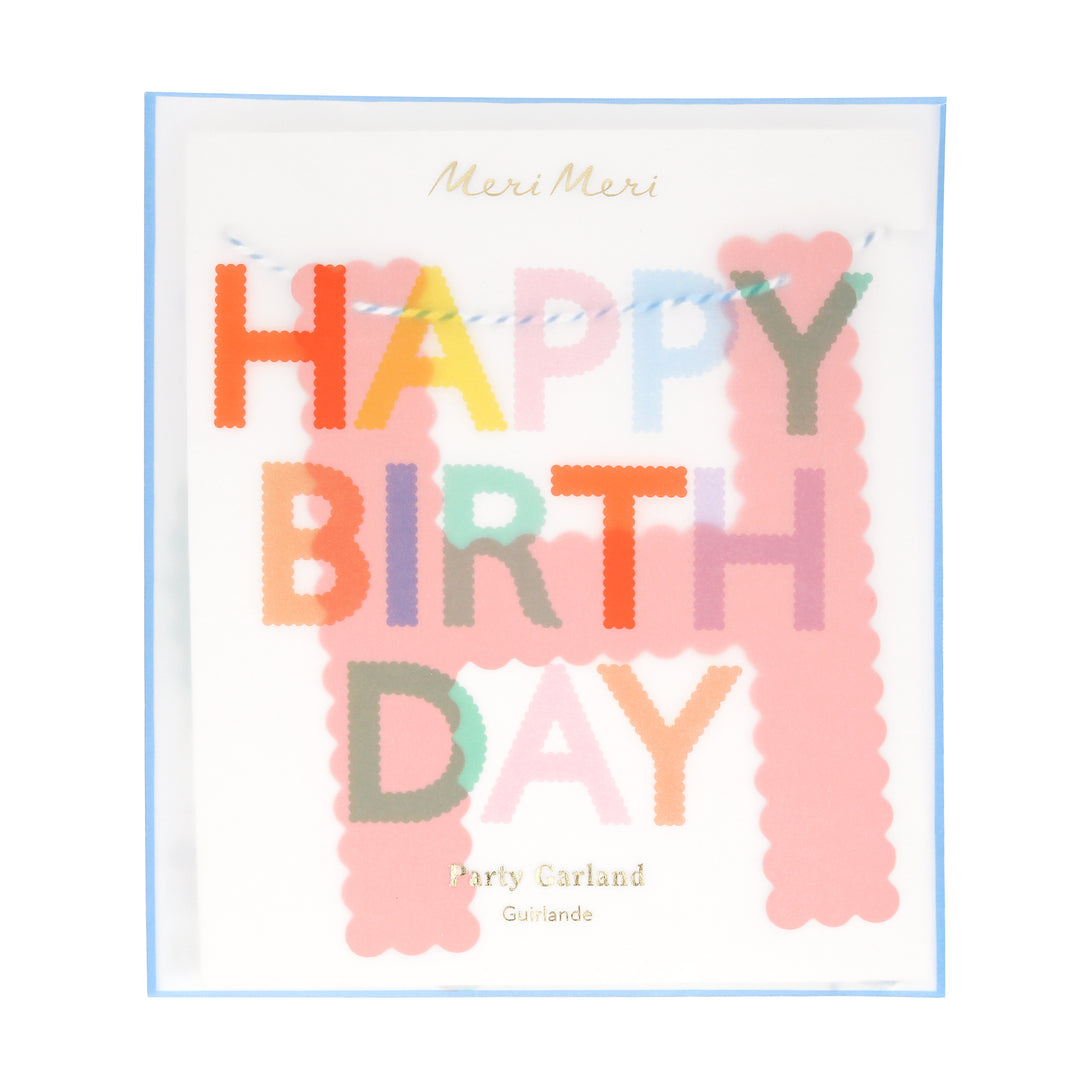 Our Happy Birthday garland, made with bright paper letters with scalloped details, adds a stylish and colourful decoration.