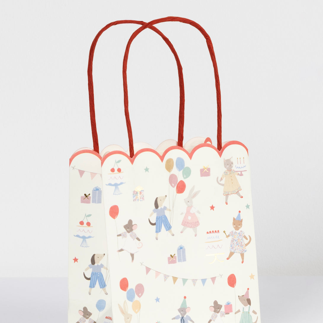 Our animal party bags feature soft colours with modern pops of red, ideal for first birthday parties, baby showers and pre-school birthday parties.