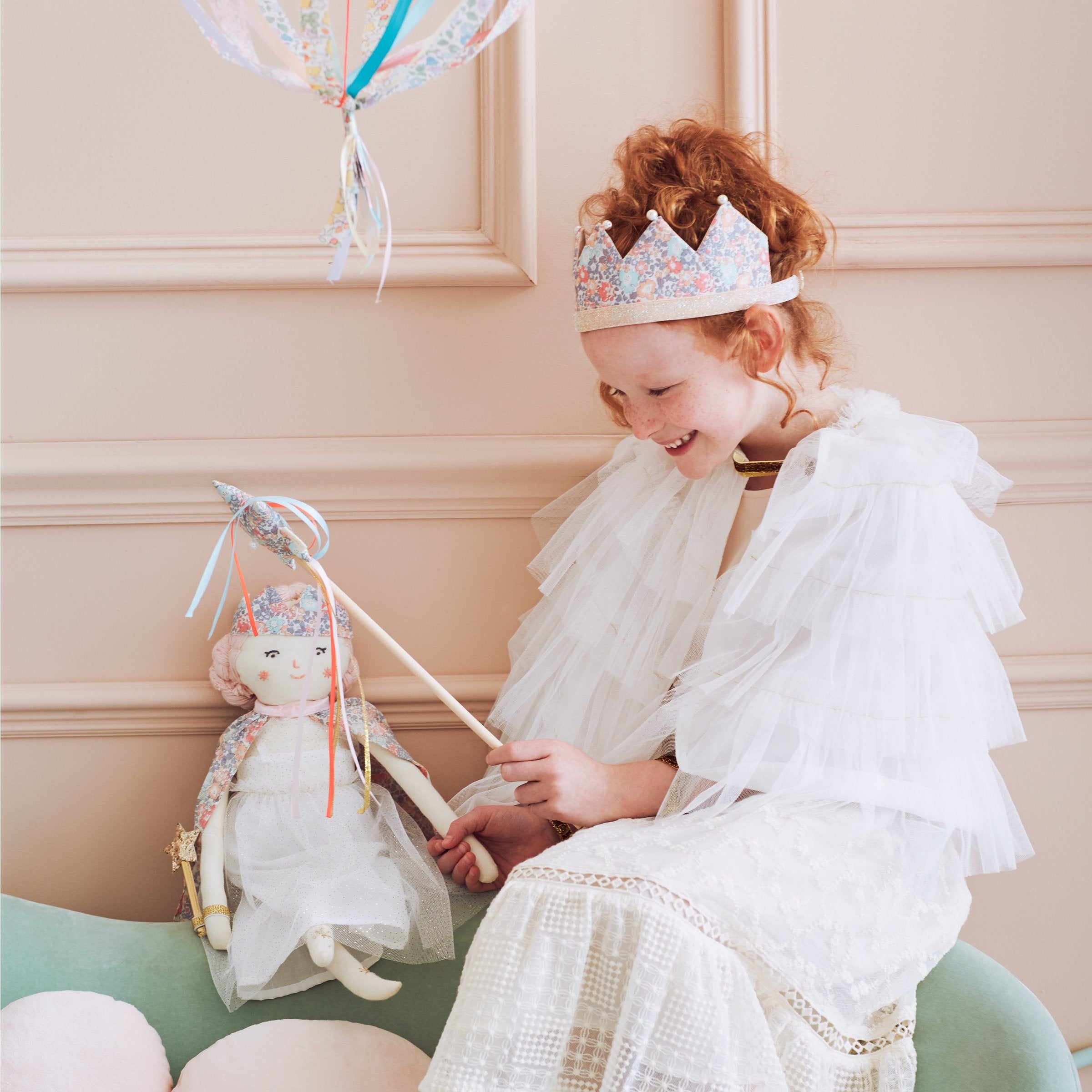Our beautiful princess crown made with Liberty floral fabric is beautifully embellished with fake pearls.