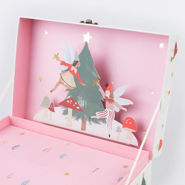 Our wooden advent calendar contains a woodland scene complete with paper fairies, presented in a suitcase, a fun interactive gift Image3