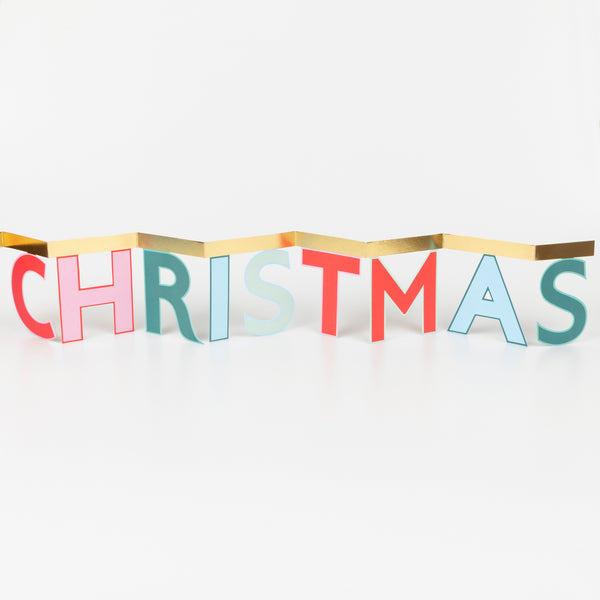 Send festive joy with our cheerful concertina card, it opens to reveal a Merry Christmas message, ideal as a mantel decoration. Image3