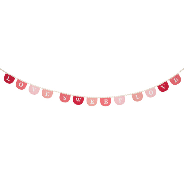 Our Valentine's decoration, a fabric garland, has scalloped pennants in red and pink with a romantic message. Image4