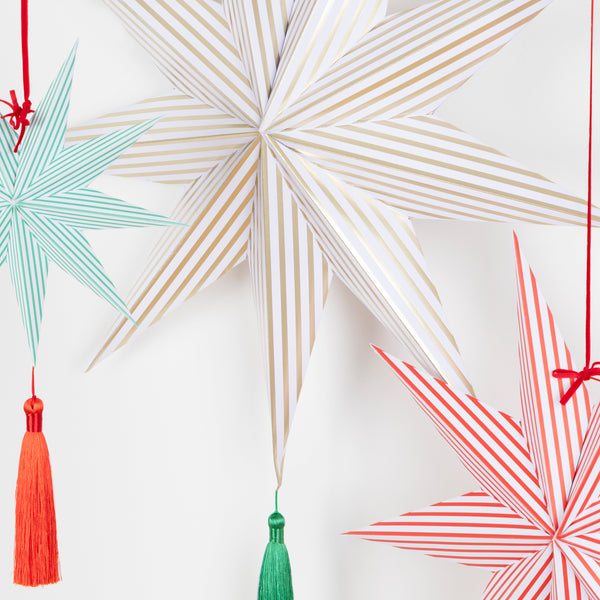 Our striped star decorations create a wonderful 3D shape, and are embellished with bright tassels and red velvet ribbons. Image3