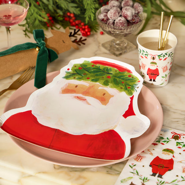 Our Santa plates, made from heavyweight paper, have a beautiful painterly quality with foliage details to give a folk-inspired feel. Image2
