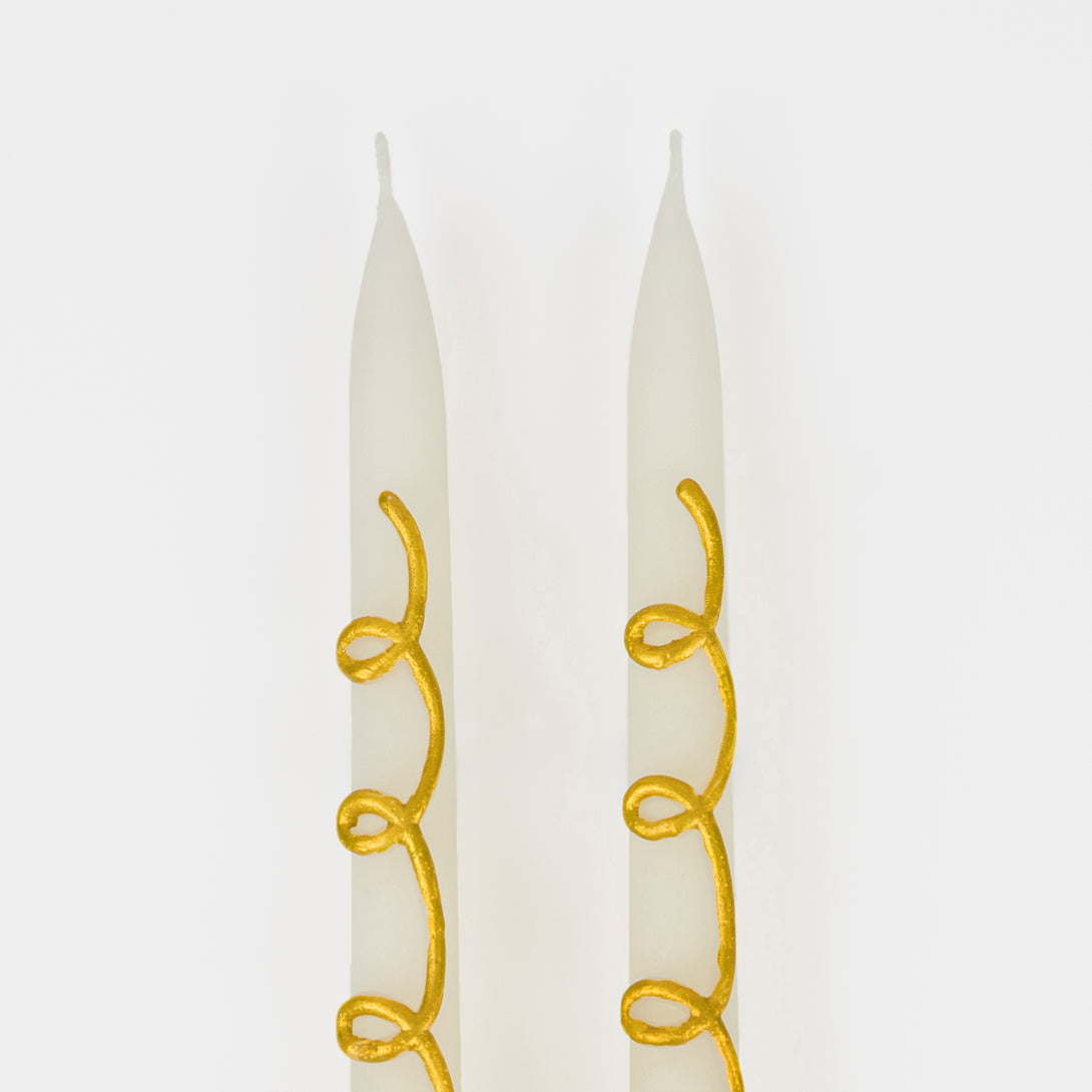 Our taper candles, with a gold swirl design, are perfect as Christmas decorative candles.