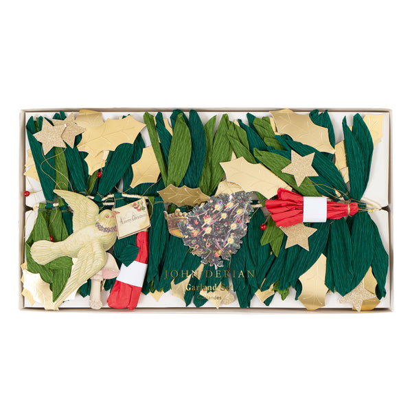 Our Christmas garlands set includes 2, one with foliage and decorative John Derian icons, the other with a Merry Christmas message. Image6