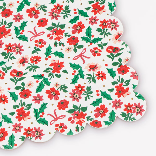 Our Christmas paper napkins, in a large size, feature an elegant red ditsy print with holly, flowers and bows, for a current yet classic look. Image2
