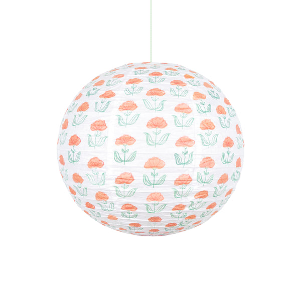 Our paper lanterns, a set of three with orange and blue floral and striped print designs, feature a round, oval and wavy shape. Image5