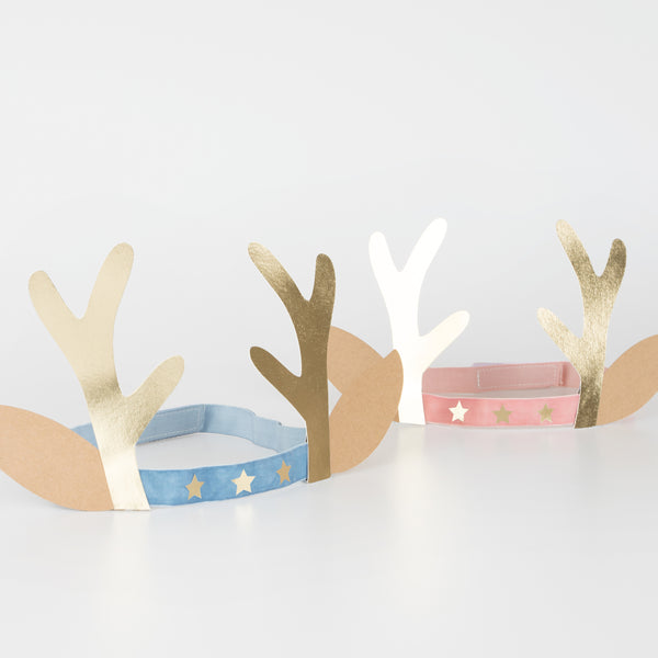 Our antler headbands, with velvet bands, shiny gold stars and antlers, and reindeer ears, make fun Christmas headwear. Image5