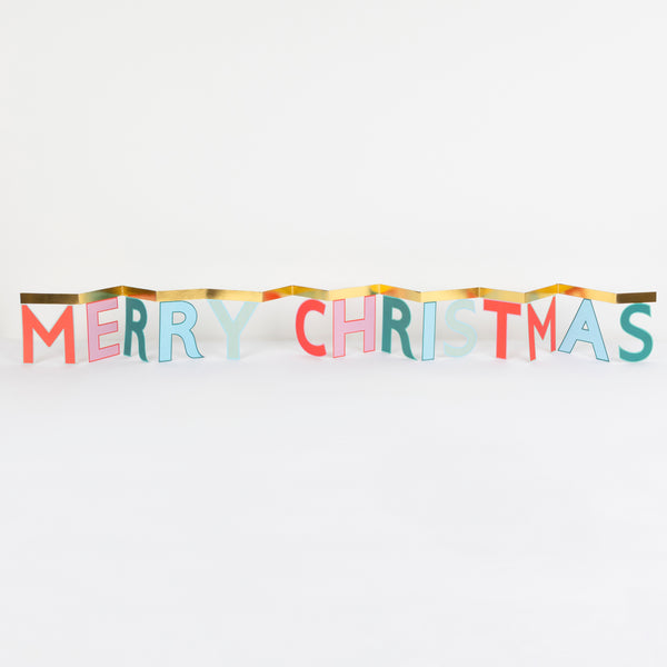 Send festive joy with our cheerful concertina card, it opens to reveal a Merry Christmas message, ideal as a mantel decoration. Image1