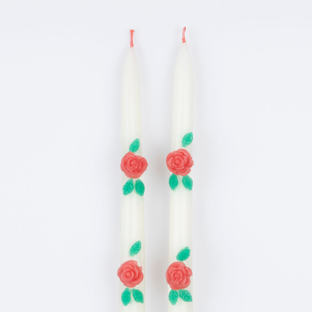 Our ivory candles have red rose embellishments and red wicks, ideal to add to your Valentine's party supplies.