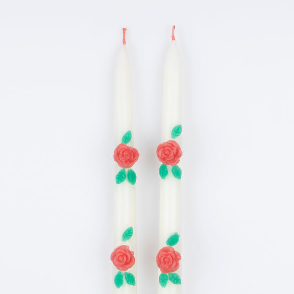 Our ivory candles have red rose embellishments and red wicks, ideal to add to your Valentine's party supplies. Image3
