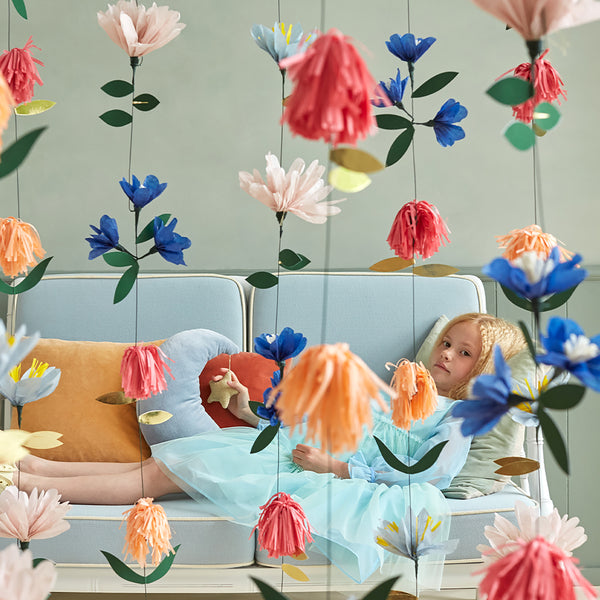 This fabulous flower decoration is crafted from colourful tissue paper flowers, with gold foil  and green leaves. Image2